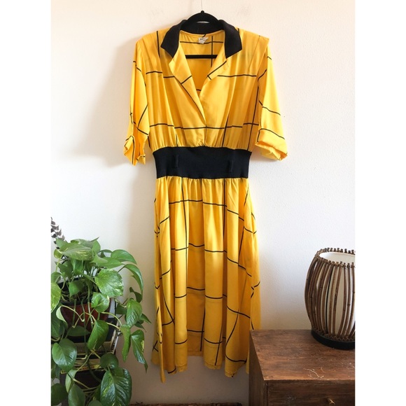 yellow and black midi dress